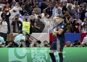 2022-12-18 - Kylian Mbappe of France celebrates his third goal during the FIFA World Cup 2022, Final football match between Argentina and France on December 18, 2022 at Lusail Stadium in Al Daayen, Qatar - FOOTBALL - WORLD CUP 2022 - FINAL - ARGENTINA V FRANCE - FIFA WORLD CUP - SOCCER