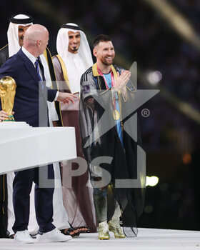 2022-12-18 - Lionel Messi of Argentina with FIFA President Giovanni Infantino after the FIFA World Cup 2022, Final football match between Argentina and France on December 18, 2022 at Lusail Stadium in Al Daayen, Qatar - FOOTBALL - WORLD CUP 2022 - FINAL - ARGENTINA V FRANCE - FIFA WORLD CUP - SOCCER