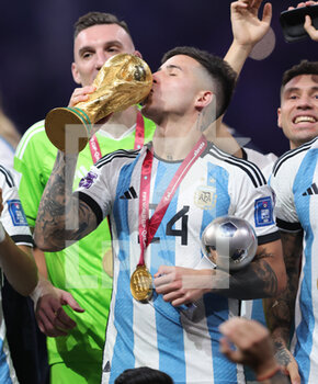 2022-12-18 - Best young Player Enzo Fernandez of Argentina celebrates with the trophy after winning the FIFA World Cup 2022, Final football match between Argentina and France on December 18, 2022 at Lusail Stadium in Al Daayen, Qatar - FOOTBALL - WORLD CUP 2022 - FINAL - ARGENTINA V FRANCE - FIFA WORLD CUP - SOCCER