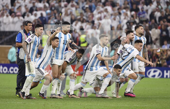 2022-12-18 - Lionel Messi of Argentina and teammates celebrate after the penalty shootout of the FIFA World Cup 2022, Final football match between Argentina and France on December 18, 2022 at Lusail Stadium in Al Daayen, Qatar - FOOTBALL - WORLD CUP 2022 - FINAL - ARGENTINA V FRANCE - FIFA WORLD CUP - SOCCER