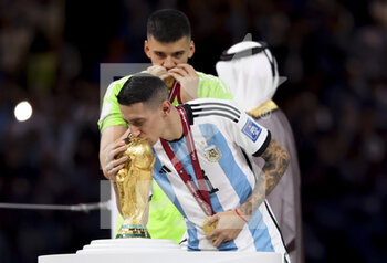 2022-12-18 - Angel Di Maria of Argentina kissing the World Cup during the trophy ceremony following the FIFA World Cup 2022, Final football match between Argentina and France on December 18, 2022 at Lusail Stadium in Al Daayen, Qatar - FOOTBALL - WORLD CUP 2022 - FINAL - ARGENTINA V FRANCE - FIFA WORLD CUP - SOCCER