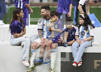 2022-12-18 - Lionel Messi of Argentina with his wife Antonella Roccuzzo and their sons following the FIFA World Cup 2022, Final football match between Argentina and France on December 18, 2022 at Lusail Stadium in Al Daayen, Qatar - FOOTBALL - WORLD CUP 2022 - FINAL - ARGENTINA V FRANCE - FIFA WORLD CUP - SOCCER