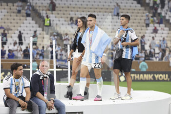 2022-12-18 - Lautaro Martinez of Argentina and his girlfriend Agustina Gandolfo, girlfriend of following the FIFA World Cup 2022, Final football match between Argentina and France on December 18, 2022 at Lusail Stadium in Al Daayen, Qatar - FOOTBALL - WORLD CUP 2022 - FINAL - ARGENTINA V FRANCE - FIFA WORLD CUP - SOCCER