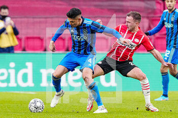 2022-01-23 - Edson Alvarez of Ajax, Mario Gotze of PSV Eindhoven during the Netherlands championship Eredivisie football match between PSV Eindhoven and Ajax on January 23, 2022 at Philips Stadion in Eindhoven, Netherlands - PSV EINDHOVEN VS AJAX - NETHERLANDS EREDIVISIE - SOCCER