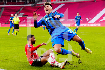 2022-01-23 - Lisandro Martinez of Ajax, Phillip Mwene of PSV Eindhoven during the Netherlands championship Eredivisie football match between PSV Eindhoven and Ajax on January 23, 2022 at Philips Stadion in Eindhoven, Netherlands - PSV EINDHOVEN VS AJAX - NETHERLANDS EREDIVISIE - SOCCER