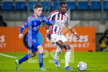 2022-01-22 - Daan Rots of FC Twente battles for the ball with Elton Kabangu of Willem II during the Netherlands championship Eredivisie football match between Willem II and FC Twente on January 22, 2022 at Koning Willem II Stadion in Tilburg, Netherlands - WILLEM II VS FC TWENTE - NETHERLANDS EREDIVISIE - SOCCER