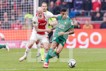2022-03-20 - Davy Klaassen of Ajax, Reiss Nelson of Feyenoord during the Netherlands championship Eredivisie football match between AFC Ajax and Feyenoord on March 20, 2022 at Johan Cruijff Arena in Amsterdam, Netherlands - AFC AJAX VS FEYENOORD - NETHERLANDS EREDIVISIE - SOCCER