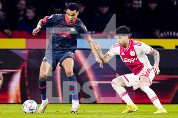 2022-11-06 - Cody Gakpo of PSV, Jorge Sanchez of Ajax during the Netherlands championship Eredivisie football match between Ajax and PSV on November 6, 2022 at the Johan Cruijff Arena in Amsterdam, Netherlands - FOOTBALL - NETHERLANDS CHAMP - AJAX V PSV - NETHERLANDS EREDIVISIE - SOCCER