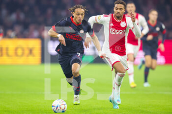 2022-11-06 - Xavi Simons of PSV and Devyne Rensch of Ajax during the Netherlands championship Eredivisie football match between Ajax and PSV on November 6, 2022 at the Johan Cruijff Arena in Amsterdam, Netherlands - FOOTBALL - NETHERLANDS CHAMP - AJAX V PSV - NETHERLANDS EREDIVISIE - SOCCER