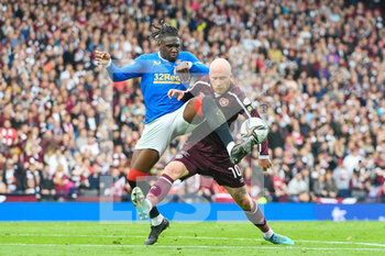 2022-05-21 - Rangers Calvin Bassey and Hearts Liam Boyce during the Scottish Cup, Final football match between Rangers and Heart of Midlothian on May 21, 2022 at Hampden Park in Glasgow, Scotland - SCOTTISH CUP FINAL - RANGERS VS HEART OF MIDLOTHIAN - SCOTTISH PREMIERSHIP - SOCCER