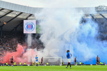 2022-05-21 - The Rangers fans let off coloured smoked before the second half of the Scottish Cup, Final football match between Rangers and Heart of Midlothian on May 21, 2022 at Hampden Park in Glasgow, Scotland - SCOTTISH CUP FINAL - RANGERS VS HEART OF MIDLOTHIAN - SCOTTISH PREMIERSHIP - SOCCER