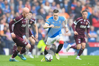 2022-05-21 - Rangers Ryan Kent takes on Hearts Liam Boyce during the Scottish Cup, Final football match between Rangers and Heart of Midlothian on May 21, 2022 at Hampden Park in Glasgow, Scotland - SCOTTISH CUP FINAL - RANGERS VS HEART OF MIDLOTHIAN - SCOTTISH PREMIERSHIP - SOCCER
