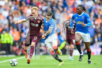 2022-05-21 - Rangers Ryan Kent pulls back Hearts Nathaniel Atkinson during the Scottish Cup, Final football match between Rangers and Heart of Midlothian on May 21, 2022 at Hampden Park in Glasgow, Scotland - SCOTTISH CUP FINAL - RANGERS VS HEART OF MIDLOTHIAN - SCOTTISH PREMIERSHIP - SOCCER