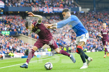 2022-05-21 - Rangers Connor Goldson pushes Hearts Josh Ginnelly during the Scottish Cup, Final football match between Rangers and Heart of Midlothian on May 21, 2022 at Hampden Park in Glasgow, Scotland - SCOTTISH CUP FINAL - RANGERS VS HEART OF MIDLOTHIAN - SCOTTISH PREMIERSHIP - SOCCER