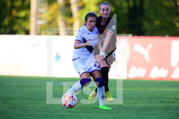 2022-08-28 - Jenna Menta of ACF Fiorentina and Kosovare Asllani of AC Milan battle for the ball   during AC Milan - ACF Fiorentina , 1st turn of Serie A Femminile Tim 2022/23 in Centro P. Vismara - Puma House of Football, Milan, Lombardy, Italy, 28/08/22 - AC MILAN VS ACF FIORENTINA - ITALIAN SERIE A WOMEN - SOCCER
