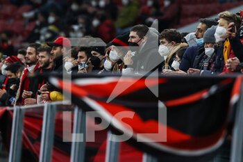 2022-01-06 - Fans wearing masks seen inside the stadium during the Serie A 2021/22 football match between AC Milan and AS Roma at Giuseppe Meazza Stadium, Milan, Italy on January 06, 2022 - AC MILAN VS AS ROMA - ITALIAN SERIE A - SOCCER