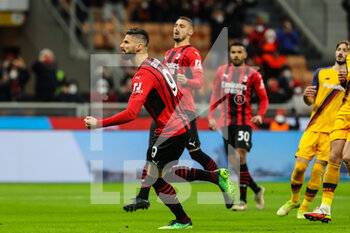 2022-01-06 - Olivier Giroud of AC Milan celebrates after scoring a goal during the Serie A 2021/22 football match between AC Milan and AS Roma at Giuseppe Meazza Stadium, Milan, Italy on January 06, 2022 - AC MILAN VS AS ROMA - ITALIAN SERIE A - SOCCER