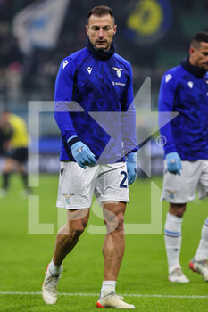 2022-01-09 - Stefan Radu of SS Lazio warms up during the Serie A 2021/22 football match between FC Internazionale and SS Lazio at Giuseppe Meazza Stadium, Milan, Italy on January 09, 2022 - INTER - FC INTERNAZIONALE VS SS LAZIO - ITALIAN SERIE A - SOCCER