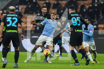 2022-01-09 - Ciro Immobile of SS Lazio in action during the Serie A 2021/22 football match between FC Internazionale and SS Lazio at Giuseppe Meazza Stadium, Milan, Italy on January 09, 2022 - INTER - FC INTERNAZIONALE VS SS LAZIO - ITALIAN SERIE A - SOCCER