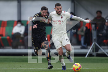 2022-01-09 - Theo Hernandez (AC Milan) and Pasquale Mazzocchi (Venezia FC) battle for the ball - VENEZIA FC VS AC MILAN - ITALIAN SERIE A - SOCCER