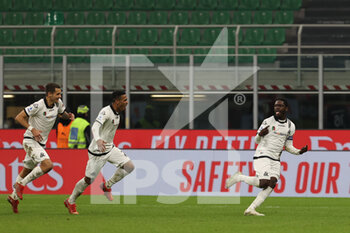 2022-01-17 - Emmanuel Gyasi of Spezia Calcio celebrates after scoring a goal during the Serie A 2021/22 football match between AC Milan and Spezia Calcio at Giuseppe Meazza Stadium, Milan, Italy on January 17, 2022 - AC MILAN VS SPEZIA CALCIO - ITALIAN SERIE A - SOCCER