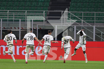 2022-01-17 - Emmanuel Gyasi of Spezia celebrates with his team mates after scoring a goal Calcio during the Serie A 2021/22 football match between AC Milan and Spezia Calcio at Giuseppe Meazza Stadium, Milan, Italy on January 17, 2022 - AC MILAN VS SPEZIA CALCIO - ITALIAN SERIE A - SOCCER