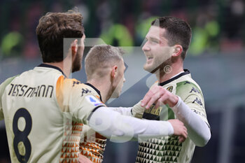 2022-01-22 - Thomas Henry of Venezia FC celebrates with his team mates after scoring a goal during the Serie A 2021/22 football match between FC Internazionale and Venezia FC at Giuseppe Meazza Stadium, Milan, Italy on January 22, 2022 - INTER - FC INTERNAZIONALE VS VENEZIA FC - ITALIAN SERIE A - SOCCER