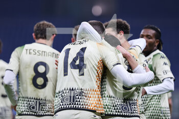 2022-01-22 - Thomas Henry of Venezia FC celebrates with his team mates after scoring a goal during the Serie A 2021/22 football match between FC Internazionale and Venezia FC at Giuseppe Meazza Stadium, Milan, Italy on January 22, 2022 - INTER - FC INTERNAZIONALE VS VENEZIA FC - ITALIAN SERIE A - SOCCER