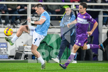 2022-02-05 - Gil Patric (Lazio) fights for the ball against Giacomo Bonaventura (Fiorentina) - ACF FIORENTINA VS SS LAZIO - ITALIAN SERIE A - SOCCER