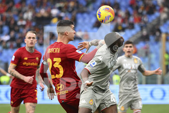 2022-02-05 - Gianluca Mancini of A.S. Roma and Kelvin Yeboah of Genoa CFC during the 24th day of the Serie A Championship between A.S. Roma vs Genoa CFC on 5th February 2022 at the Stadio Olimpico in Rome, Italy. - AS ROMA VS GENOA CFC - ITALIAN SERIE A - SOCCER