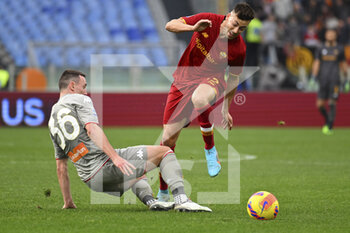 2022-02-05 - Stephan El Shaarawy of A.S. Roma and Laurens Serpe of Genoa CFC during the 24th day of the Serie A Championship between A.S. Roma vs Genoa CFC on 5th February 2022 at the Stadio Olimpico in Rome, Italy. - AS ROMA VS GENOA CFC - ITALIAN SERIE A - SOCCER