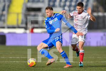 2022-02-13 - Szymon Zurkowski (Empoli FC) and Razvan Marin (Cagliari Calcio) - EMPOLI FC VS CAGLIARI CALCIO - ITALIAN SERIE A - SOCCER
