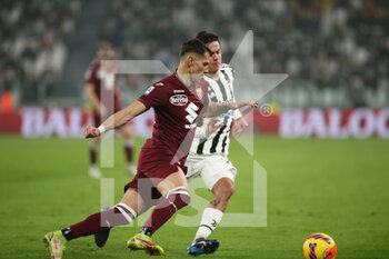 2022-02-18 - Sasa Lukic (Torino FC) vs Paulo Dybala (Juventus FC) - JUVENTUS FC VS TORINO FC - ITALIAN SERIE A - SOCCER