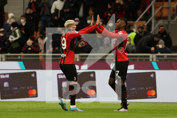 2022-02-25 - Rafael Leao of AC Milan celebrates with Theo Hernandez of AC Milan  during the Serie A 2021/22 football match between AC Milan and Udinese Calcio at Giuseppe Meazza Stadium, Milan, Italy on February 25, 2022 - AC MILAN VS UDINESE CALCIO - ITALIAN SERIE A - SOCCER