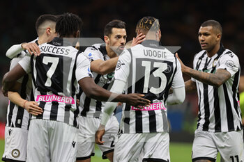 2022-02-25 - Destiny Udogie of Udinese Calcio celebrates with his team mates after scoring a goal during the Serie A 2021/22 football match between AC Milan and Udinese Calcio at Giuseppe Meazza Stadium, Milan, Italy on February 25, 2022 - AC MILAN VS UDINESE CALCIO - ITALIAN SERIE A - SOCCER