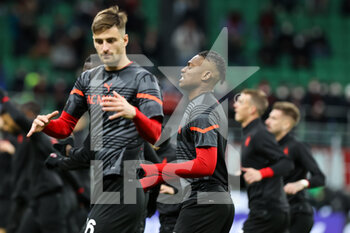 2022-02-25 - Rafael Leao of AC Milan warms up during the Serie A 2021/22 football match between AC Milan and Udinese Calcio at Giuseppe Meazza Stadium, Milan, Italy on February 25, 2022 - AC MILAN VS UDINESE CALCIO - ITALIAN SERIE A - SOCCER