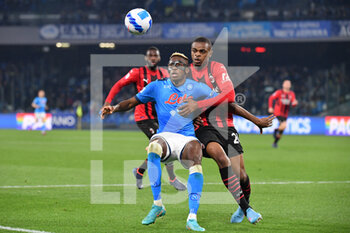2022-03-06 - ,Milan’s defender Pierre Kalulu vies for the ball with Napoli's forward Victor Osimhen  - SSC NAPOLI VS AC MILAN - ITALIAN SERIE A - SOCCER