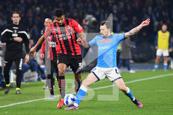 2022-03-06 - Milan's forward Junior Messias compete for the ball with Napoli's defender Mario Rui  - SSC NAPOLI VS AC MILAN - ITALIAN SERIE A - SOCCER