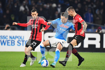 2022-03-06 - Napoli's midfielder Eljif Elmas compete for the ball with Milan's defender Alessandro Florenzi and Milan's midfielder Rade Krunic  - SSC NAPOLI VS AC MILAN - ITALIAN SERIE A - SOCCER