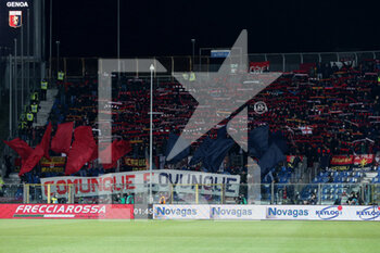 2022-03-13 - Genoa CFC supporters hold their scarves up and show a banner - ATALANTA BC VS GENOA CFC - ITALIAN SERIE A - SOCCER