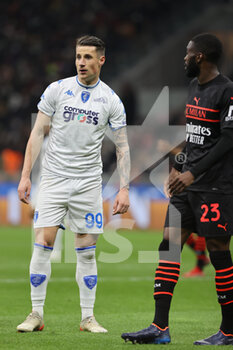 2022-03-12 - Andrea Pinamonti of Empoli FC in action during the Serie A 2021/22 football match between AC Milan and Empoli FC at Giuseppe Meazza Stadium, Milan, Italy on March 12, 2022 - AC MILAN VS EMPOLI FC - ITALIAN SERIE A - SOCCER