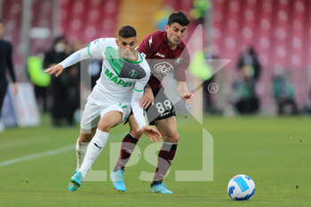 2022-03-12 - Diego Perotti of US SALERNITANA compete for the ball with Mert Muldur of US SASSUOLO during the Serie A match between US Salernitana and US Sassuolo at Stadio Arechi on March 12, 2022 in Salerno, Italy. - US SALERNITANA VS US SASSUOLO - ITALIAN SERIE A - SOCCER