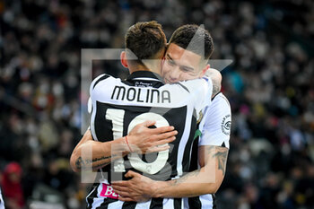 2022-03-13 - Udinese's Nahuel Molina celebrates after scoring a goal 1-0 with Udinese's Nehuen Perèz - UDINESE CALCIO VS AS ROMA - ITALIAN SERIE A - SOCCER