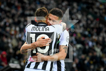2022-03-13 - Udinese's Nahuel Molina hugs Udinese's Nehuen Perèz - UDINESE CALCIO VS AS ROMA - ITALIAN SERIE A - SOCCER