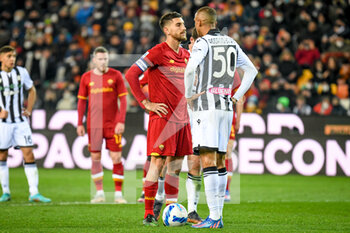 2022-03-13 - Roma's Lorenzo Pellegrini rage against Udinese's Rodrigo Nascimento Becao after getting the penalty - UDINESE CALCIO VS AS ROMA - ITALIAN SERIE A - SOCCER