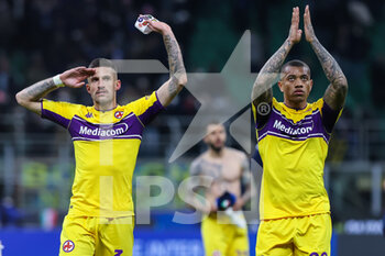 2022-03-19 - Cristiano Biraghi of ACF Fiorentina and Igor of ACF Fiorentina celebrate during the Serie A 2021/22 football match between FC Internazionale and ACF Fiorentina at Giuseppe Meazza Stadium, Milan, Italy on March 19, 2022 - INTER - FC INTERNAZIONALE VS ACF FIORENTINA - ITALIAN SERIE A - SOCCER