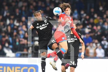 2022-03-19 - Destiny Udogie ( Udinese Calcio) and  Alessandro Zanoli (SSC Napoli) They compete for the ball during the Serie A 2021/22 match between SSC. Napoli and Udinese Calcio at Diego Armando Maradona Stadium, Italy March 19,2022 - SSC NAPOLI VS UDINESE CALCIO - ITALIAN SERIE A - SOCCER