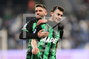 2022-03-18 - Kaan Ayhan of US SASSUOLO celebrates after scoring a goal with Domenico Berardi of US SASSUOLO during the Serie A match between US Sassuolo and Spezia Calcio at Mapei Stadium-Città del Tricolore on March 18, 2022 in Reggio Emilia, Italy. - US SASSUOLO VS SPEZIA CALCIO - ITALIAN SERIE A - SOCCER