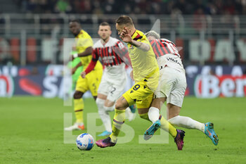 2022-04-04 - Marko Arnautovic of Bologna FC competes for the ball with Theo Hernandez of AC Milan during the Serie A 2021/22 football match between AC Milan and Bologna FC at Giuseppe Meazza Stadium, Milan, Italy on April 04, 2022 - AC MILAN VS BOLOGNA FC - ITALIAN SERIE A - SOCCER