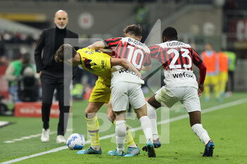 2022-04-04 - Aaron Hickey of Bologna FC competes for the ball with Brahim Diaz of AC Milan and Fikayo Tomori of AC Milan during the Serie A 2021/22 football match between AC Milan and Bologna FC at Giuseppe Meazza Stadium, Milan, Italy on April 04, 2022 - AC MILAN VS BOLOGNA FC - ITALIAN SERIE A - SOCCER